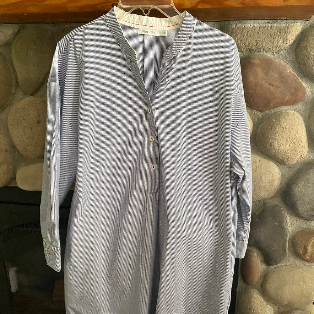 Cotton pin striped midi dress with tab collar and button up front.